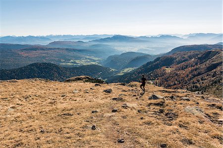 rosengarten - Italy, Trentino Alto Adige, Non valley, hiker on Luco Mount in autumn day. Stock Photo - Rights-Managed, Code: 879-09043368