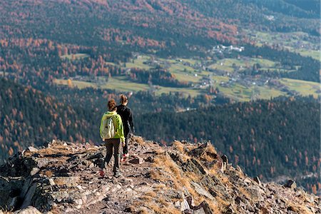 Italy, Trentino Alto Adige, Non valley, two women hikers descend from the top of Luco Mount. Stock Photo - Rights-Managed, Code: 879-09043379