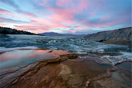 Sunset at Mammoth Hot Springs, Yellowstone National Park, Wyoming, USA Foto de stock - Con derechos protegidos, Código: 879-09128736