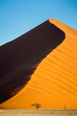 simsearch:862-03365353,k - People climbing on the huge dune in the Sossusvlei desert,Namib Naukluft National Park,Namibia,Africa Stock Photo - Rights-Managed, Code: 879-09189789