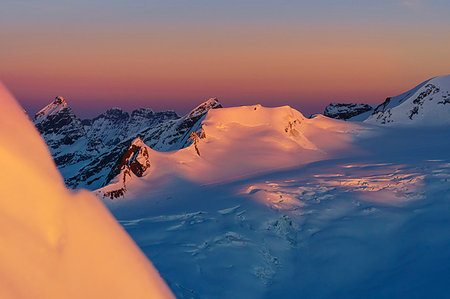 ski touring - The paeks of Aletschglacier at sunrise. Aletschorn, Vallese, Switzerland, Europe. Stock Photo - Rights-Managed, Code: 879-09190288