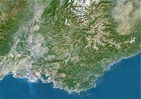 Région Provence-Alpes-Côte d'Azur, en France, True Image Satellite de la couleur. Région Provence - Alpes - Côte d'Azur, France, image satellite couleur vraie. Cette image a été compilée à partir de données acquises par les satellites LANDSAT 5 & 7. Photographie de stock - Rights-Managed, Code: 872-06052794