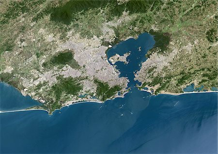 Rio De Janeiro, Brazil, True Colour Satellite Image. Rio de Janeiro, Brazil. True colour satellite image of the city of Rio de Janeiro, taken on 28 October 2001, using LANDSAT 7 data. Stock Photo - Rights-Managed, Code: 872-06052934