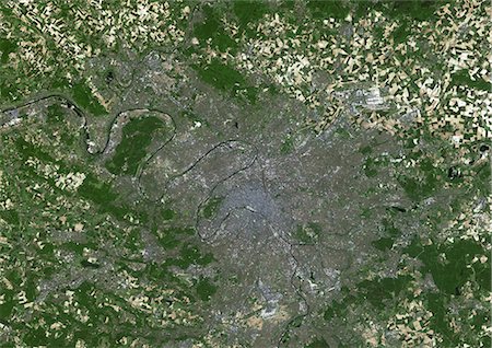 Paris, France, True Colour Satellite Image. Paris, France. True colour satellite image of Paris, capital city of France. Image taken on 23 May 2001, using LANDSAT 7 data. Stock Photo - Rights-Managed, Code: 872-06052931