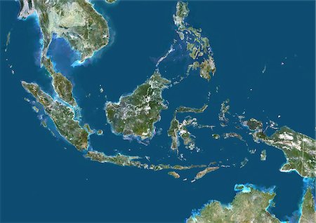 Indonesia, Asia, True Colour Satellite Image With Border. Satellite view of Indonesia (with border). This image was compiled from data acquired by LANDSAT 5 & 7 satellites. Stock Photo - Rights-Managed, Code: 872-06053273