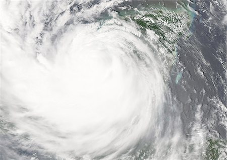 Hurricane Dean, Mexico, In 2007, True Colour Satellite Image. Hurricane Dean on 21 August 2007 over the Yucatan, Mexico. It was the strongest tropical cyclone of the 2007 Atlantic hurricane season. True-colour satellite image using MODIS data. Stock Photo - Rights-Managed, Code: 872-06053831