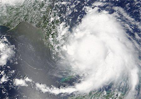 Hurricane Katrina, Louisiana, Us, On 25/08/2005, True Colour Satellite Image. Hurricane Katrina on 25 August 2005 crossing southern Florida, US. True-colour satellite image using MODIS data. Stock Photo - Rights-Managed, Code: 872-06053850