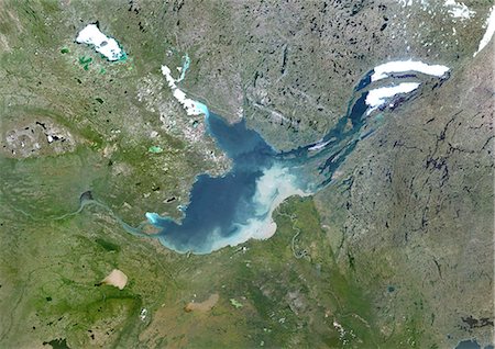 Great Slave Lake, Canada, True Colour Satellite Image. True colour satellite image of Great Slave Lake, the second-largest lake in the Northwest Territories of Canada. Composite image using LANDSAT 5 data. Stock Photo - Rights-Managed, Code: 872-06053891