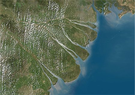 satellite image - Mekong Delta, Vietnam, True Colour Satellite Image. True colour satellite image of the Mekong Delta in Vietnam. The Mekong delta region encompasses a large portion of southeastern Vietnam. The Mekong River empties into the South China Sea. Composite image using LANDSAT 7 data. Stock Photo - Rights-Managed, Code: 872-06053929