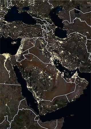 Middle East at night in 2012, with Saudi Arabia. This satellite image with country borders shows urban and industrial lights. Stock Photo - Rights-Managed, Code: 872-08082696