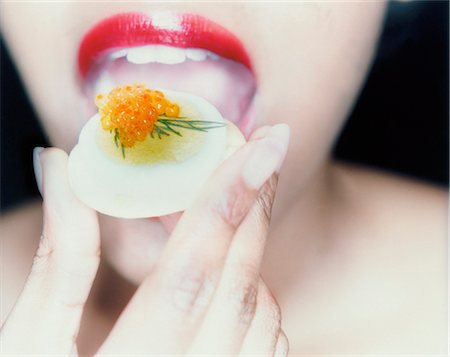 simsearch:873-06440787,k - Woman Eating Caviar Stock Photo - Rights-Managed, Code: 873-06440784