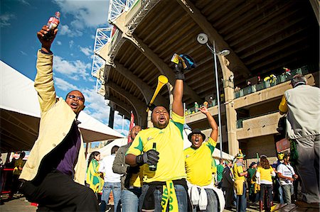 south african - Soccer fans cheering outside a soccer stadium Stock Photo - Rights-Managed, Code: 873-07156832