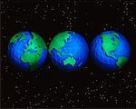 Trois Globes affichant les Continents du monde