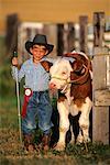 Young Farmer with Calf