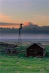 Windmill and Farm After Storm Near Dorothy, Alberta, Canada