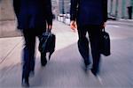 Businessmen Walking with Briefcases