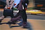 Blurred View of Businessmen Running, Toronto, Ontario, Canada