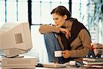 Woman at Computer, Holding Mug