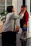 Businesswoman and Daughter Talking at Front Door (J6-020 Ab)
