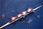 Blurred View of People Rowing a Quad