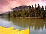 Canoes near Lake Bow River, Banff National Park Alberta, Canada