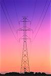 Electrical Transmission Tower At Sunset