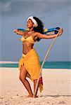 Femme en maillot de bain, Holding Wind Sock sur Aruba Beach