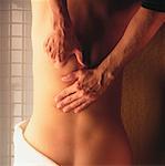 Overhead View of Woman Having Back Massaged