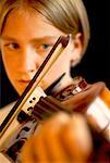 Close-Up of Girl Playing Violin