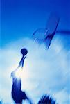 Blurred View of Woman Playing Basketball