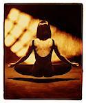 Back View of Woman Sitting in Lotus Position, Floating