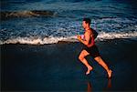 Man Running on Beach