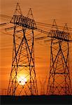 Silhouette of Transmission Towers At Sunset