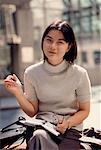 Portrait of Businesswoman Using Journal