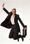 Portrait of Businesswoman Jumping In Air