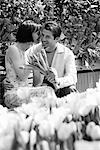 Couple with Bouquet of Tulips Outdoors