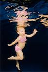 Baby in Swimwear Under Water