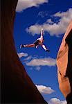 Man Jumping over Gap Arizona, USA