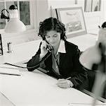 Businesswoman Using Telephone