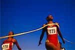 Women Crossing Finish Line