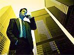 Businessman in Front of Buildings