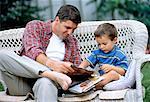 Père et fils, lecture en plein air