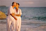 Mature Couple Kissing on Beach