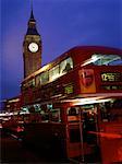 Double Decker Buses, Big Ben and Parliament Buildings at Night London, England