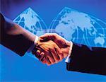 Business Handshake and World Map