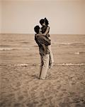 Couple Embracing on Beach