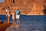 Family Walking on Beach Lake Powell, Arizona, USA