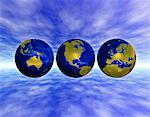 Three Globes Displaying Continents of the World in Sky