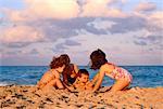 Children in Swimear, Playing on Beach