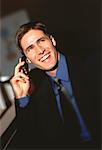 Portrait of Businessman Using Cell Phone